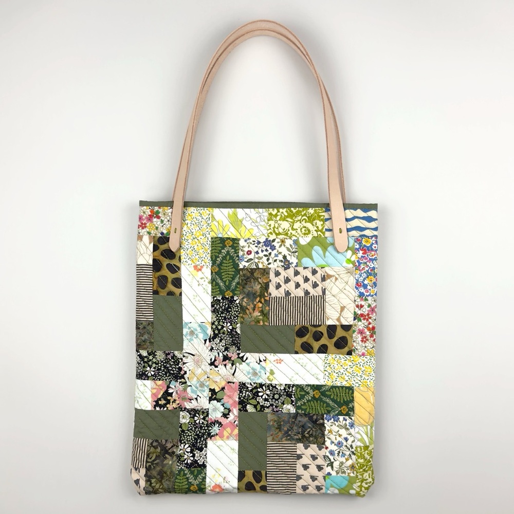 Quilted bag one of a kind mixed fabrics in scrap quilt style. Very craftcore!